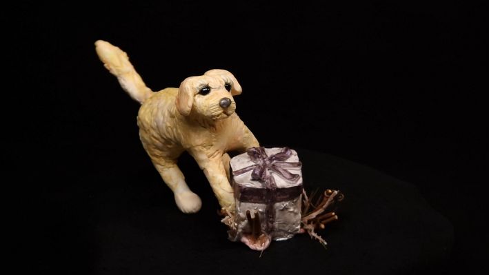 Sammelfigur mit Päckchen 7